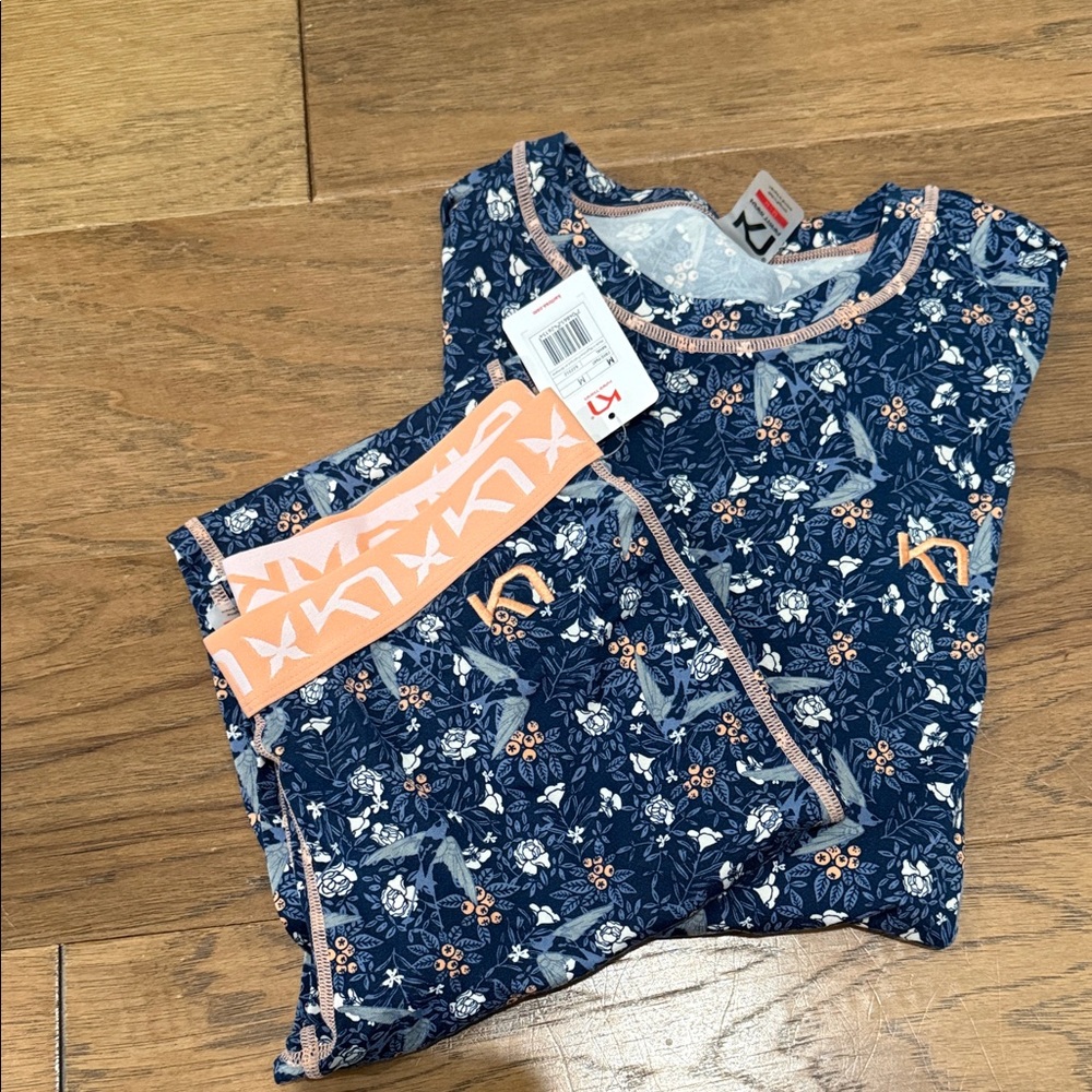 Floral Blue technical base layer. Top worn once, bottoms never worn.